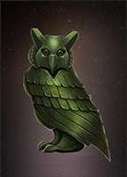 Green owl figurine on a dark vignette background.