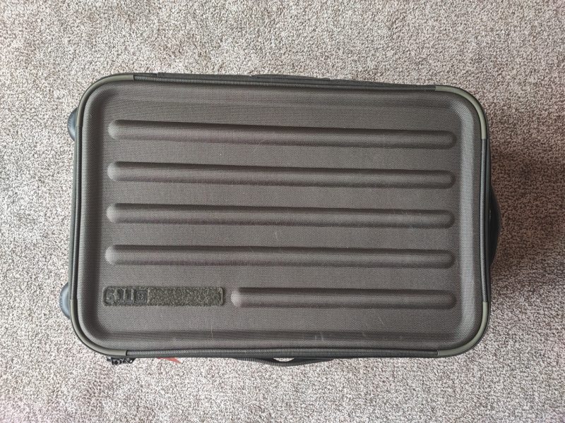 The Load Up 22 Carry On has a sleek exterior with a Velcro name tag patch for identification.