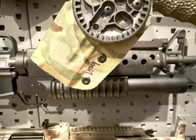 A VP9 holster after a home craft-bench DIY Cordra wrap in MultiCam camouflage.  