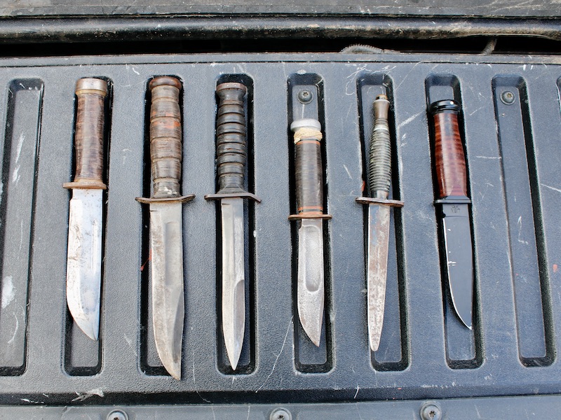 Some period knives, and one reproduction. A Cattaragus 225Q, an MK2, a Marble's, and a Fairbairn Sykes and a newer MK1.