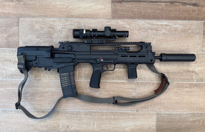 Springfield Hellion with optic and suppressor.