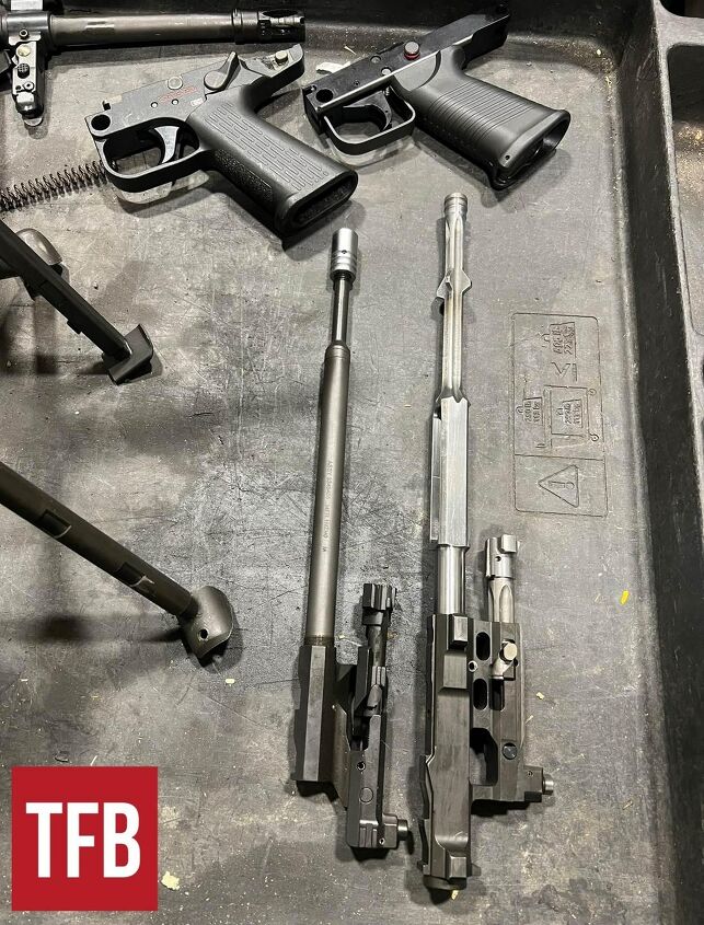 hks next gen twist on the fn minimi the mg43, FN bolt carrier group assembly next to the HK carrier By Lynndon Schooler