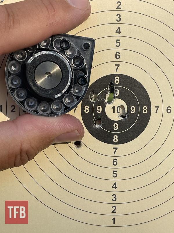 One of the series at about 40 meters, with a flyer. The magazine is used to compare the size. Shot from a kneeling position with a tripod.