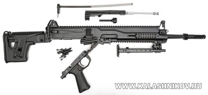 inside russia s rpl 20 machine gun, Disassembled RPL 20 late prototype note the bolt carrier and main spring assembly Photo credit Kalashnikov ru