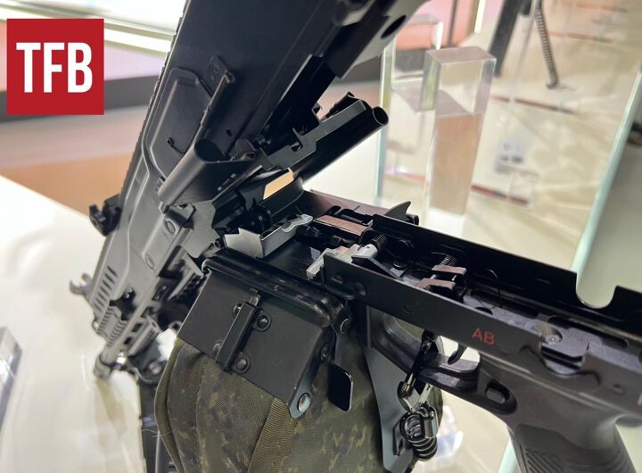 inside russia s rpl 20 machine gun, RPL 20 with the feed tray cover open and the feed tray lifted By Lynndon Schooler