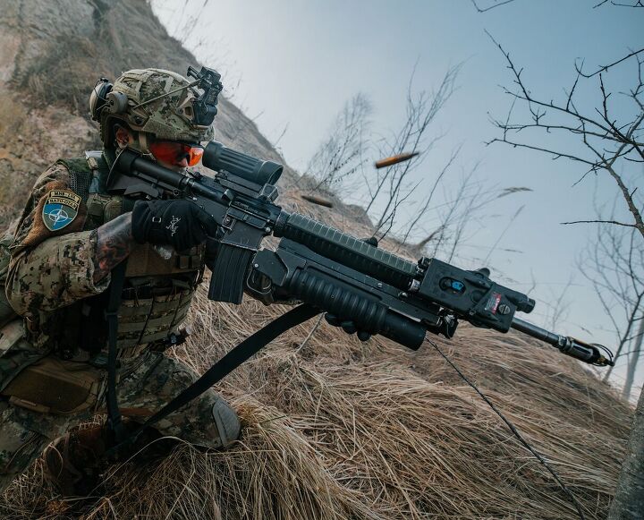 potd colt canada c7a2 with m203a1 grenade launcher