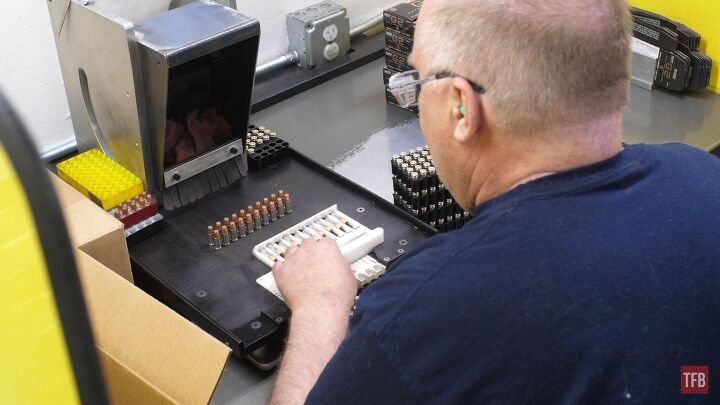 the rimfire report celebrating 75 years of cci a trip to lewiston, This employee is hand checking boxes of Speer Gold Dot ammunition