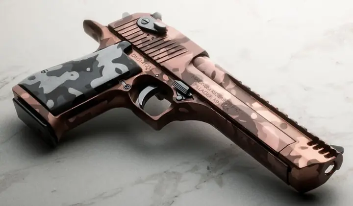 potd magnum research embraces gold rush with limited ember reaper