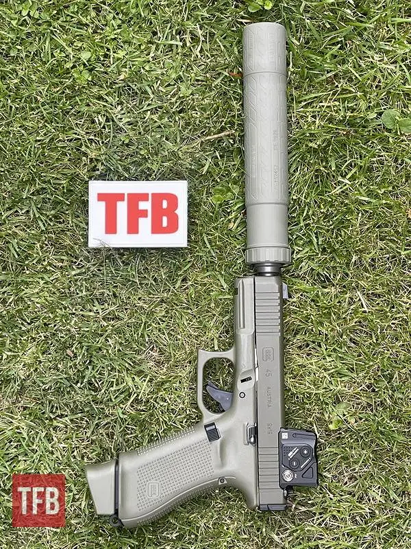 potd custom glock 45 mos hunter edition with b t titanium suppressor