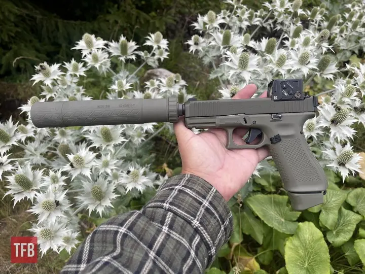 potd custom glock 45 mos hunter edition with b t titanium suppressor