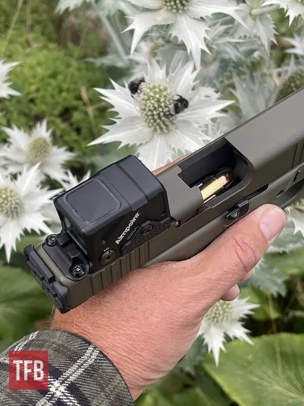 potd custom glock 45 mos hunter edition with b t titanium suppressor