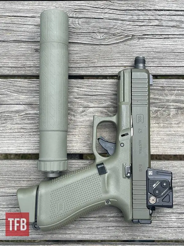 potd custom glock 45 mos hunter edition with b t titanium suppressor
