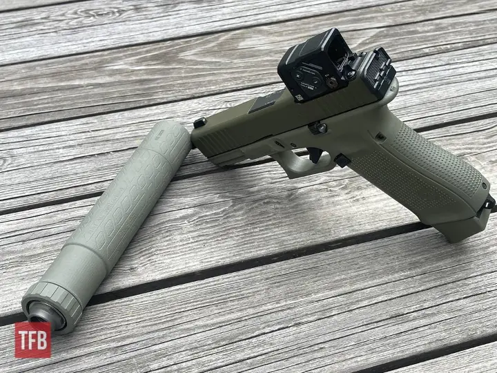 potd custom glock 45 mos hunter edition with b t titanium suppressor
