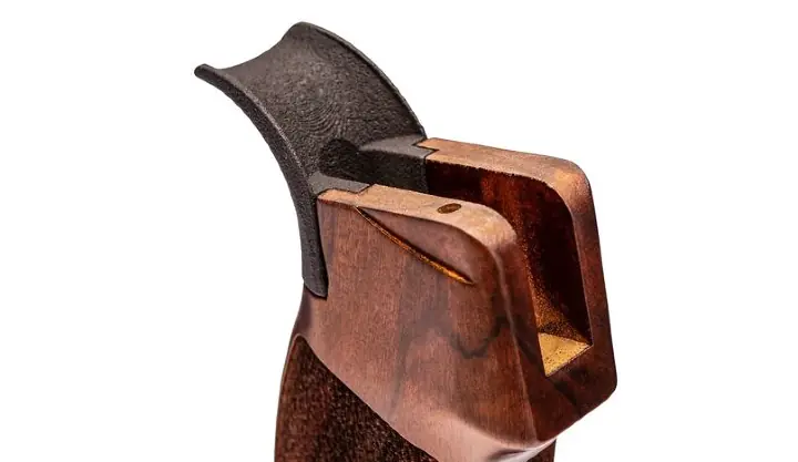 woox introduces new vigilante beavertail walnut grip
